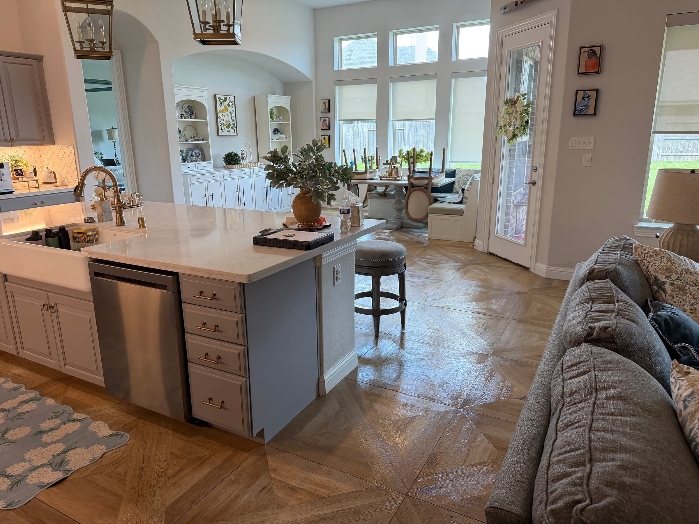 An open kitchen and living space in a Gen 2 Cleaners client's home
