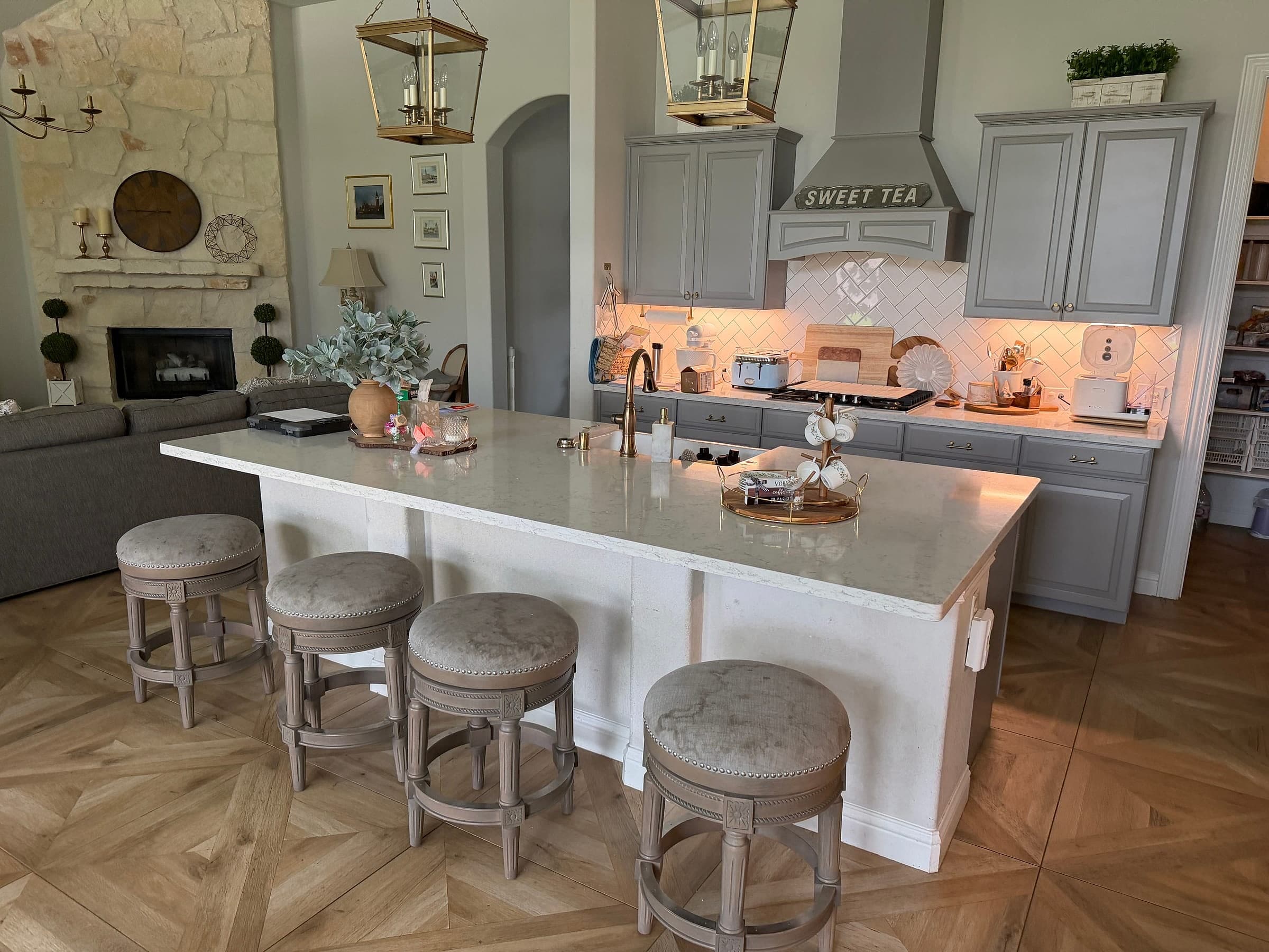 A bright, well-kept Houston kitchen with a large island, cared for by Gen 2 Cleaners